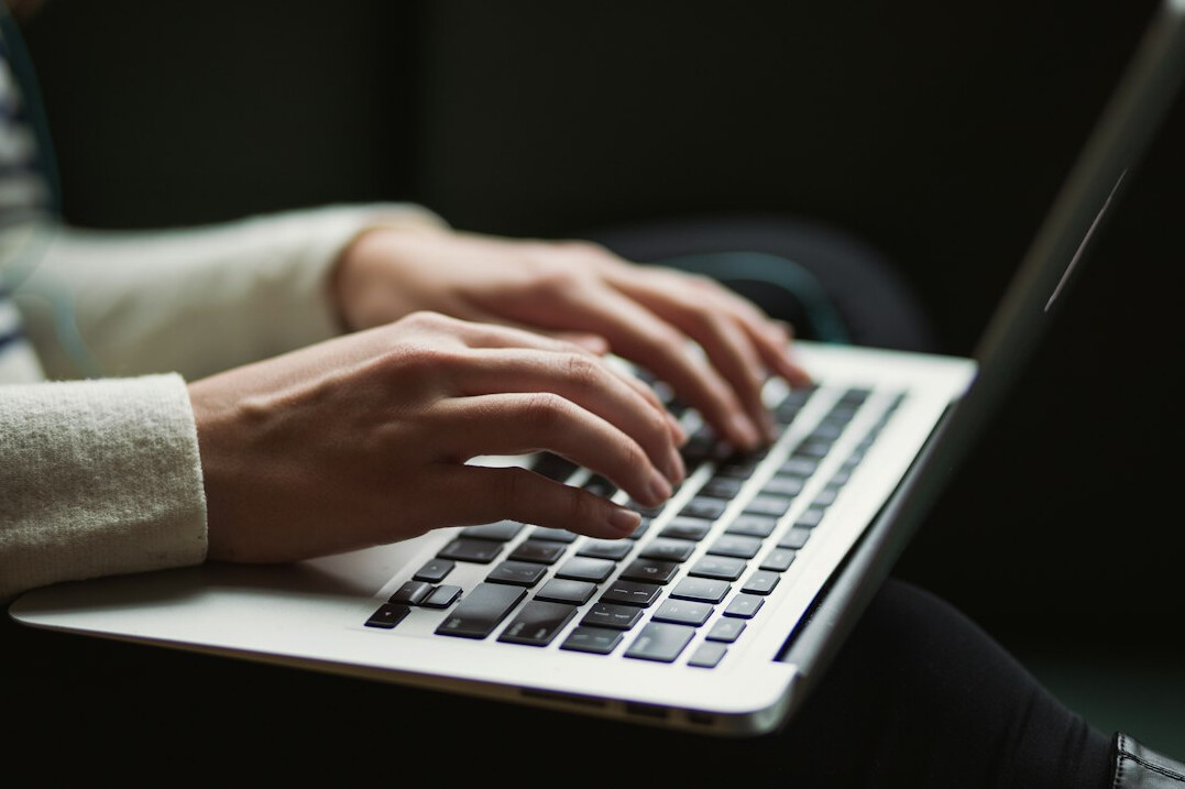 person using laptop for finance
