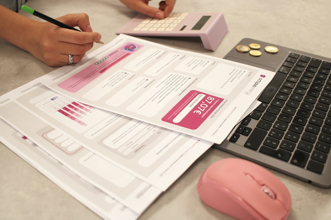 person reviewing financial reports