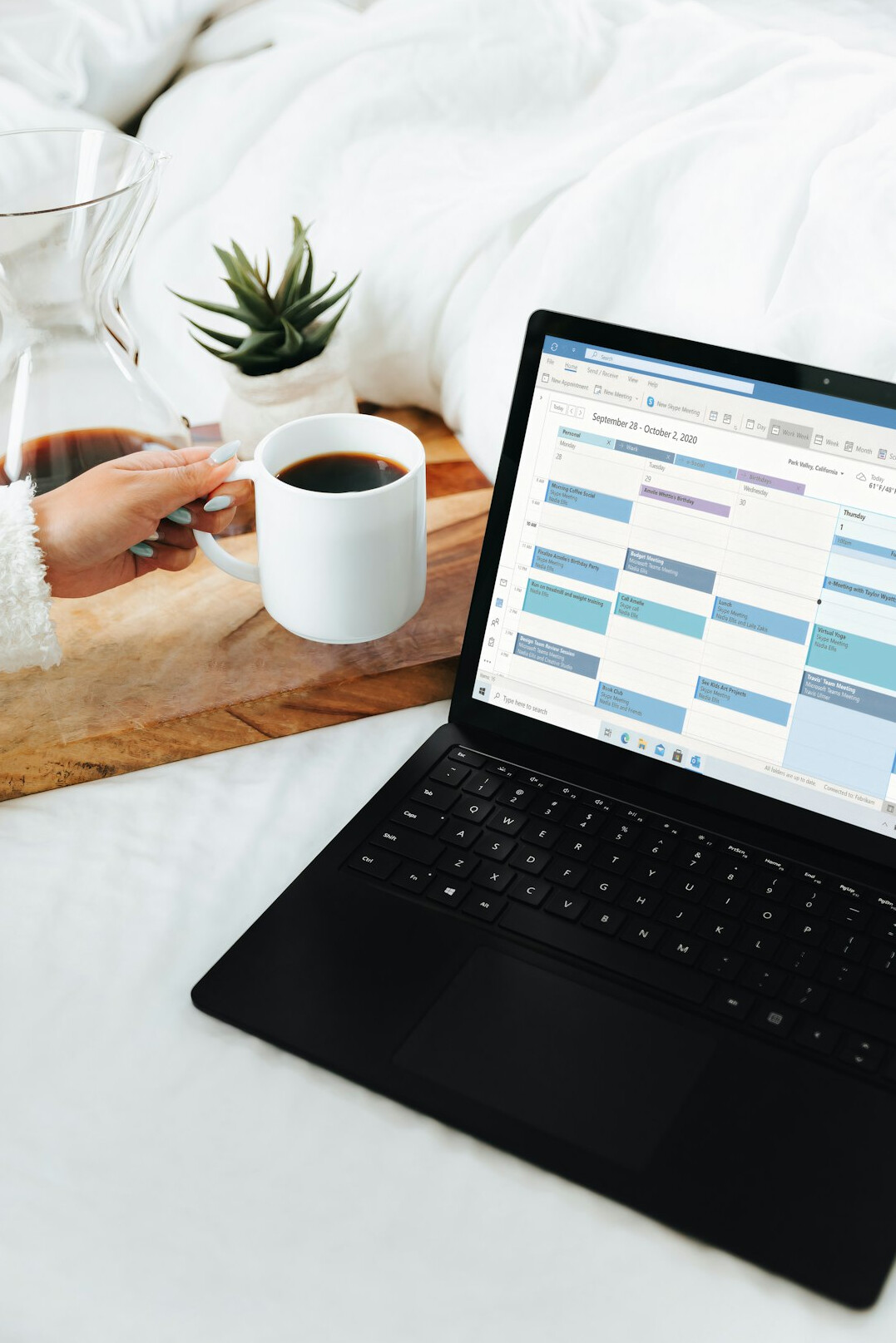 person reviewing budget on laptop